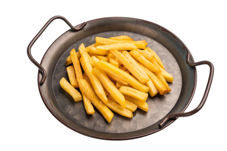 Homemade golden French fries in a tray isolated on white background.の写真素材