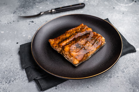 Japanese Teriyaki salmon fish fillet with sauce glaze. gray background. top view.の写真素材