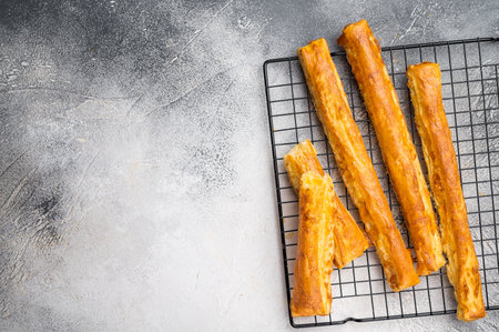 Cheese bread sticks, butter salted bread. white background. top view.