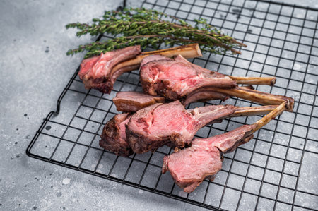Roasted lamb chops steaks, mutton meat cutlets. gray background. top view.の写真素材