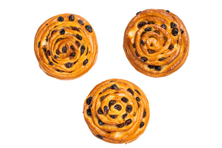 Danish raisin pastry swirls isolated on white background. top view.の写真素材