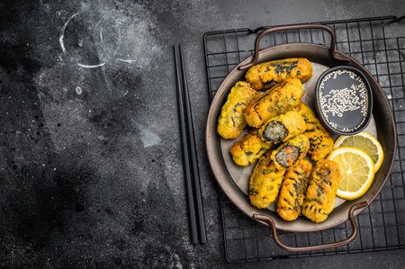 Crispy seaweed noodle rolls Gimmari, Korean deep fried seaweed rolls. black background. top view.の写真素材