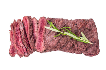 Grilled and sliced Flank beef steak, BBQ meat isolated on white background. top view.の写真素材