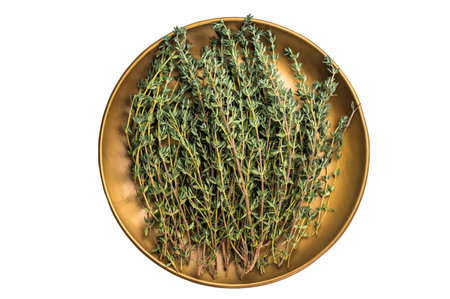 Herb thyme, fresh sprigs in plate isolated on white background. top view.