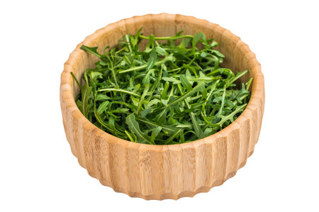 Fresh arugula leaves, vibrant and peppery, perfect for adding a zesty touch to salads and sandwiches. isolated on white background. top view.の写真素材