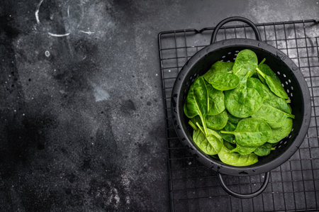 Nutrient rich fresh spinach leaves, perfect for adding flavor and health benefits to your meals and...