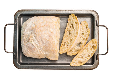 Fresh baked and sliced ciabatta bread isolated on white background.