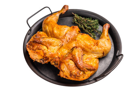 Roast Spatchcocked Chicken, poultry meat with herbs and spices isolated on white background. top view.の写真素材