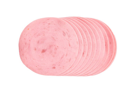 Perfectly stacked slices of pink mortadella or bologna, a classic cold cut, isolated on a clean white surfaceの写真素材