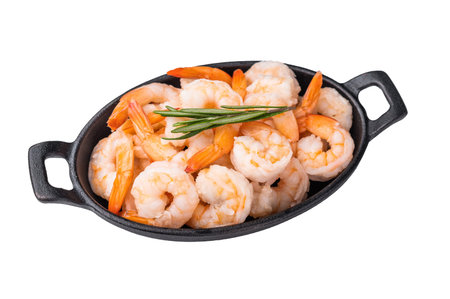 A black bowl filled with shrimp and herbs. The shrimp are cut into small pieces and are arranged in a way that they are not overlapping. The bowl isolated on a white backgroundの写真素材