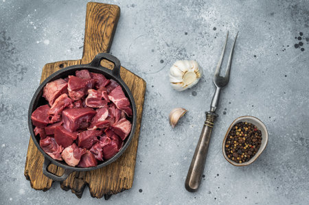 Fresh chopped pork heart cubes ready for cooking, ideal for rustic dishes, sautÃ©ing and flavorful traditional cuisineの写真素材