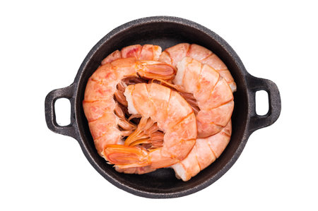 Raw Headless Red Argentine shrimps, Prawns in a skillet isolated on white background. top view.の写真素材