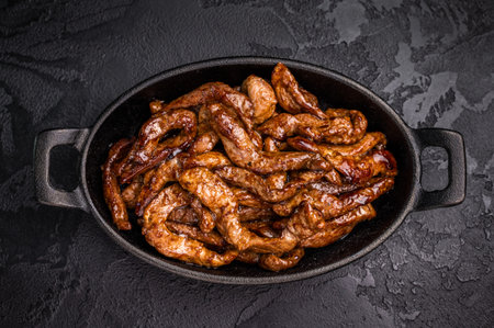 Korean Beef Meat Bulgogi Hot Plate. black background. top view.の写真素材