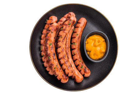 Appetizing fried wieners with golden-yellow dipping sauce. Ideal image for a menu, fast-casual ads, or cateringの写真素材