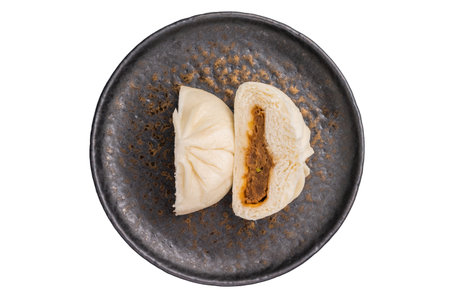 Baozi Bun, Chinese Steamed bun with meat on plate isolated on white background. top view.