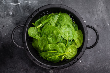 Nutrient rich fresh spinach leaves, perfect for adding flavor and health benefits to your meals and...