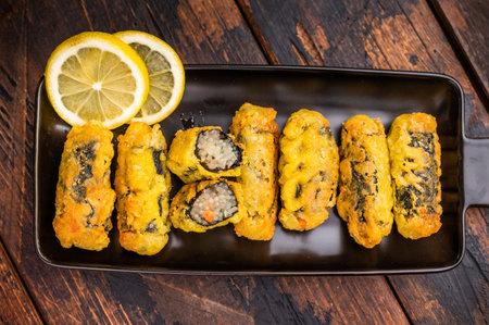 Nori Roll Gimmari, Kimmari Korean Snack with Minced Chicken and Seaweed Wrap. wooden background. top view.の写真素材