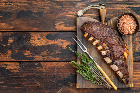 Smoked and grilled lamb breast ribs with crispy crust isolated on white background meat cutoutの写真素材