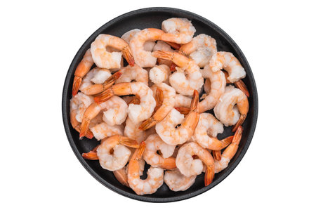 Fried shrimp in a black bowl isolated on a white background.の写真素材