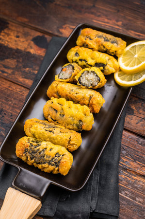 Nori Roll Gimmari, Kimmari Korean Snack with Minced Chicken and Seaweed Wrap. wooden background. top...