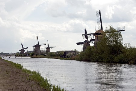 dutch windmill attraction for tourists at kinderdijkの写真素材