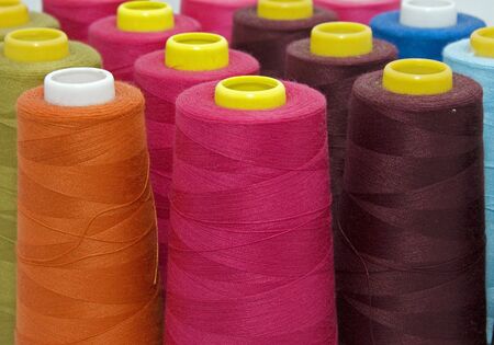 multi color spools with cotton for use in textile industry or fashion industry