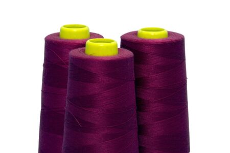 red purple cotton spools used in textile and fashion industry