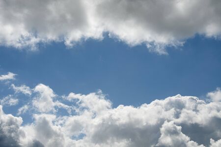 blue sky and dark and white cloudsの写真素材