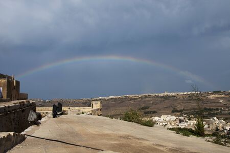 rainbow over malta islandの写真素材