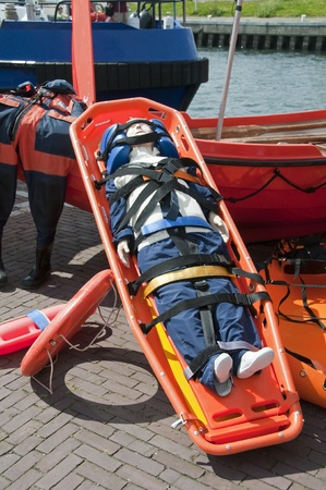 emergency stretcher with doll as a person for trainingの写真素材