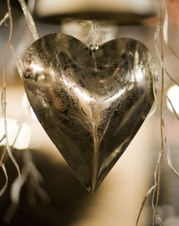 decoration from a metal hart with reflectionの写真素材