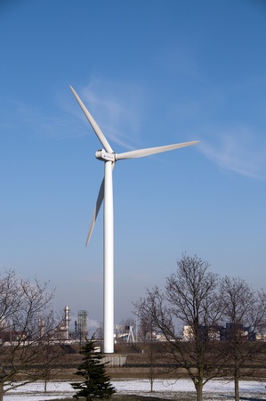 alternative energie by windmill with blue skyの写真素材