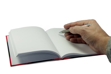 male hand writing in empty bookの写真素材