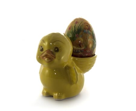 easter duck with egg on isolated whiteの写真素材