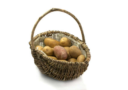 patatoes in bamboo basketの写真素材
