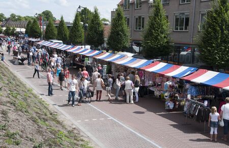 MIDDELHARNIS,HOLLAND - JULI 20  Unidentified people shopping on the dutch market,on April 11, 2011 in Middelharnis, Holland  This market is the biggest market in this place and hold once a year in Juliのeditorial素材