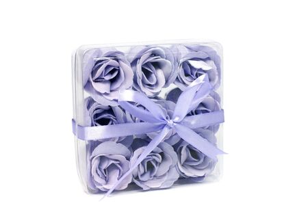 transparent box with decoration roses in pnkの写真素材