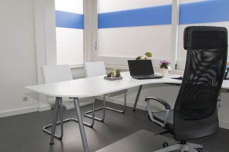 clean white office in hospitalの写真素材