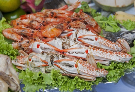 plate with asian seafood shrimps and crabの写真素材