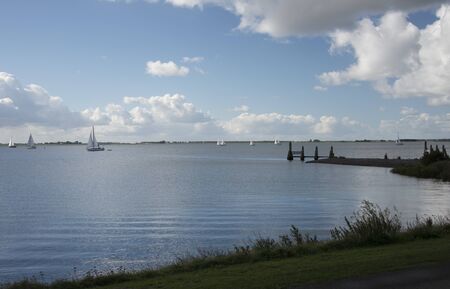 sailing boats on the lake called haringvliet  in Hollandの写真素材