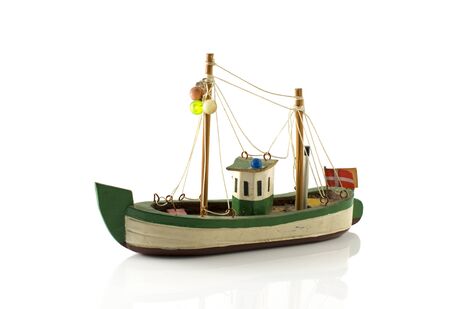 old danish model fish boat isolated on whiteの写真素材