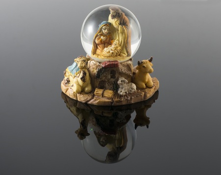 christmas snow glass bowl with jesus mara and josephの写真素材