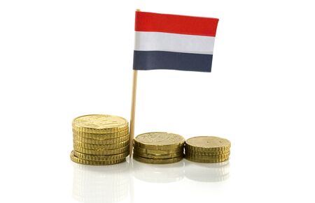 dutch flag with euro coins isolated on whiteの写真素材
