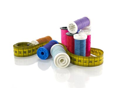 sewing thread and tailor equipment isolated on whiteの写真素材