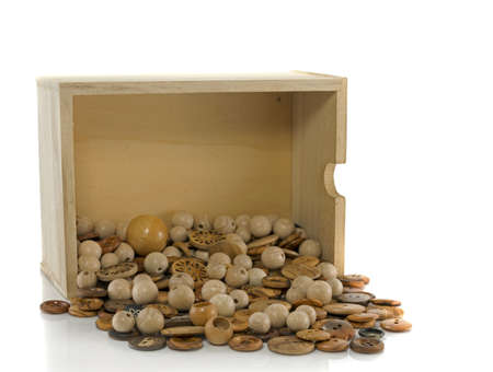box with old wooden tailors buttonsの写真素材