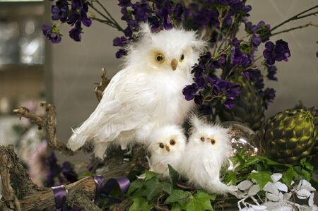 imitation snow owl as decoration birdsの写真素材