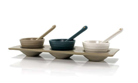 three porcelain cups isolated on whiteの写真素材