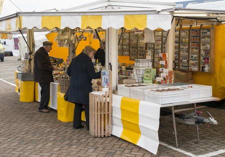 people shopping on the market at a tea stallのeditorial素材