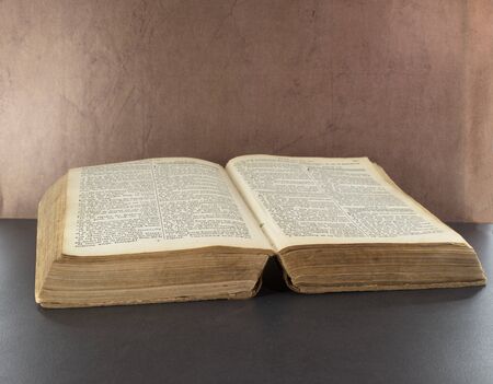 old bible book with brown backgroundの写真素材