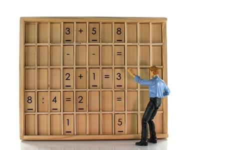 teacher with wooden education boardの写真素材